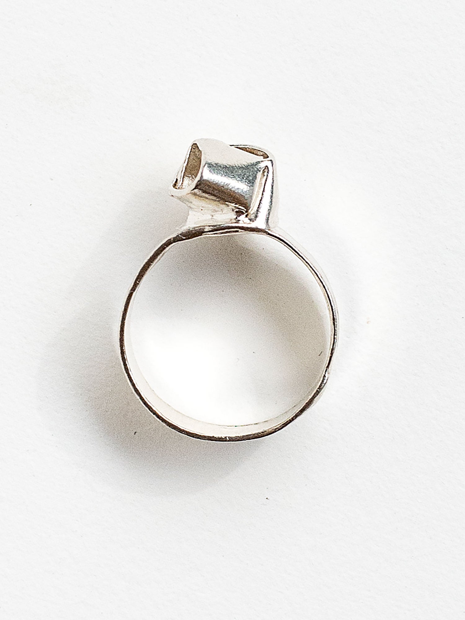 A sterling silver ring with a knot design made in Toronto by Canadian jewelry designer Michelle Ross