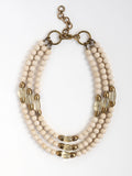 Multistrand necklace with cream riverstone and lemon quartz beads and gold brass accents by Michelle Ross