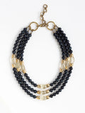 Multistrand necklace with blue tigers eye and lemon quartz beads and gold brass accents by Michelle Ross