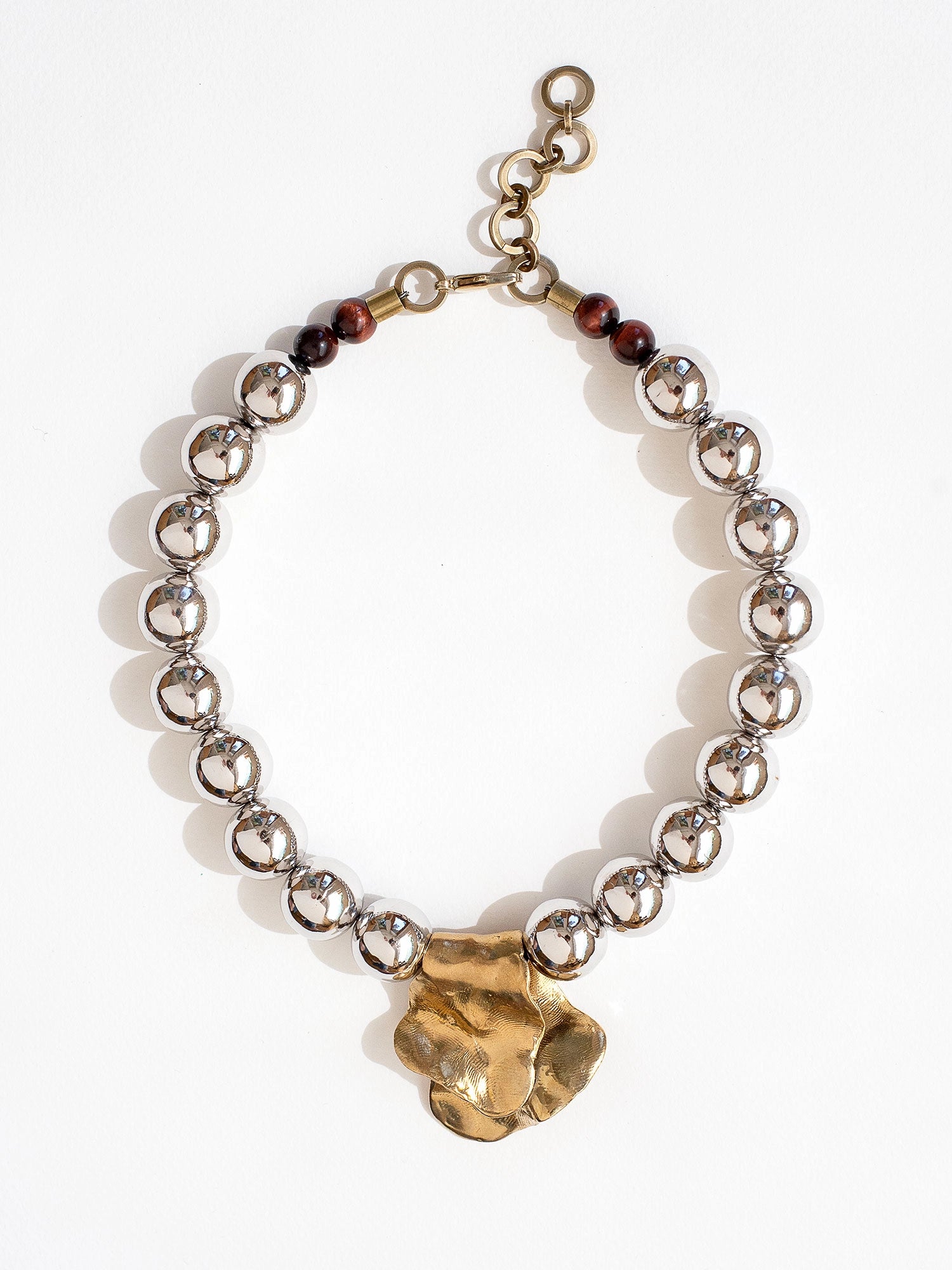 silver rhodium beaded necklace with brass pendant and garnet details by Michelle Ross