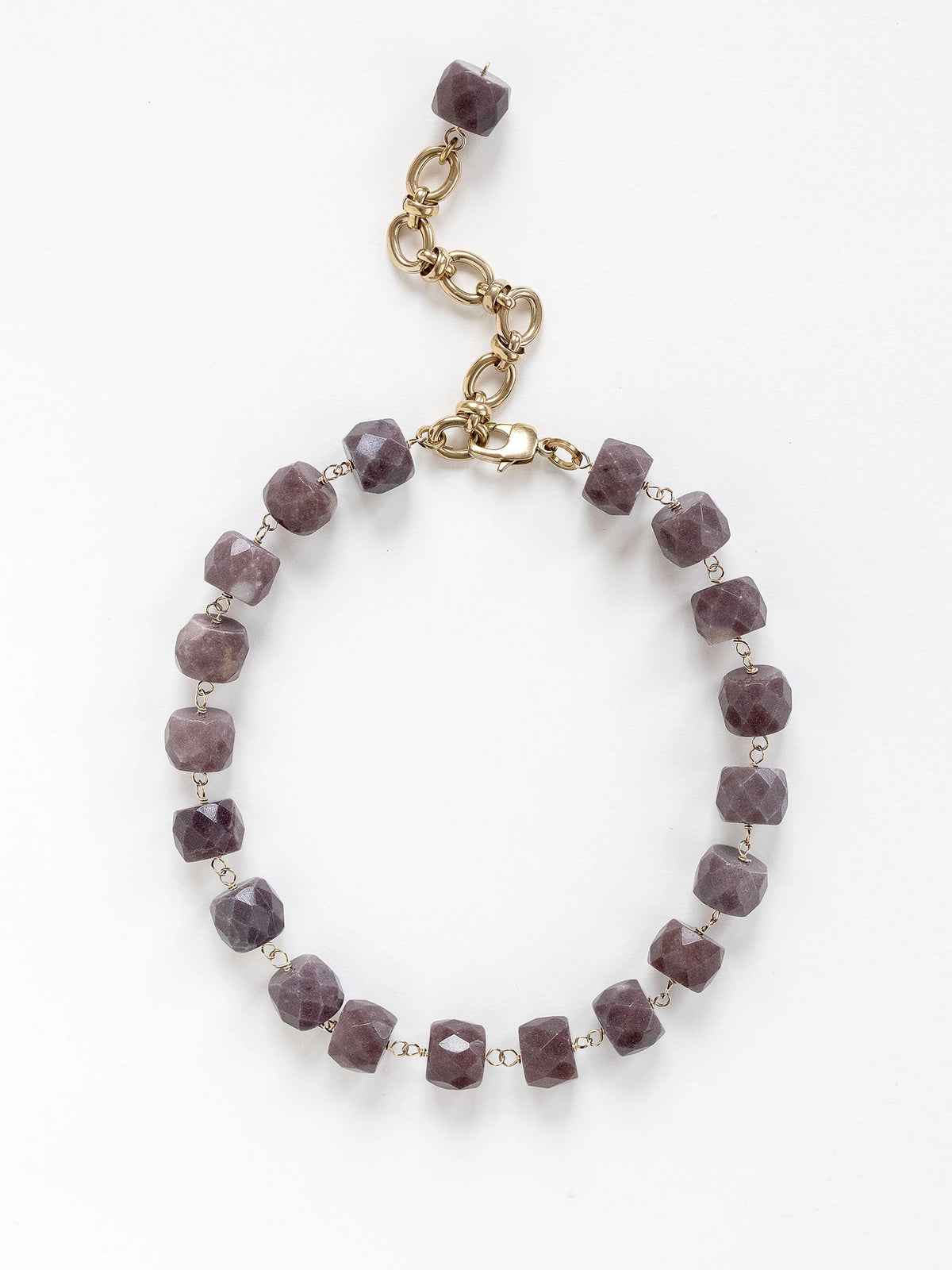 A brass and beaded chain necklace with purple aventurine by Michelle Ross