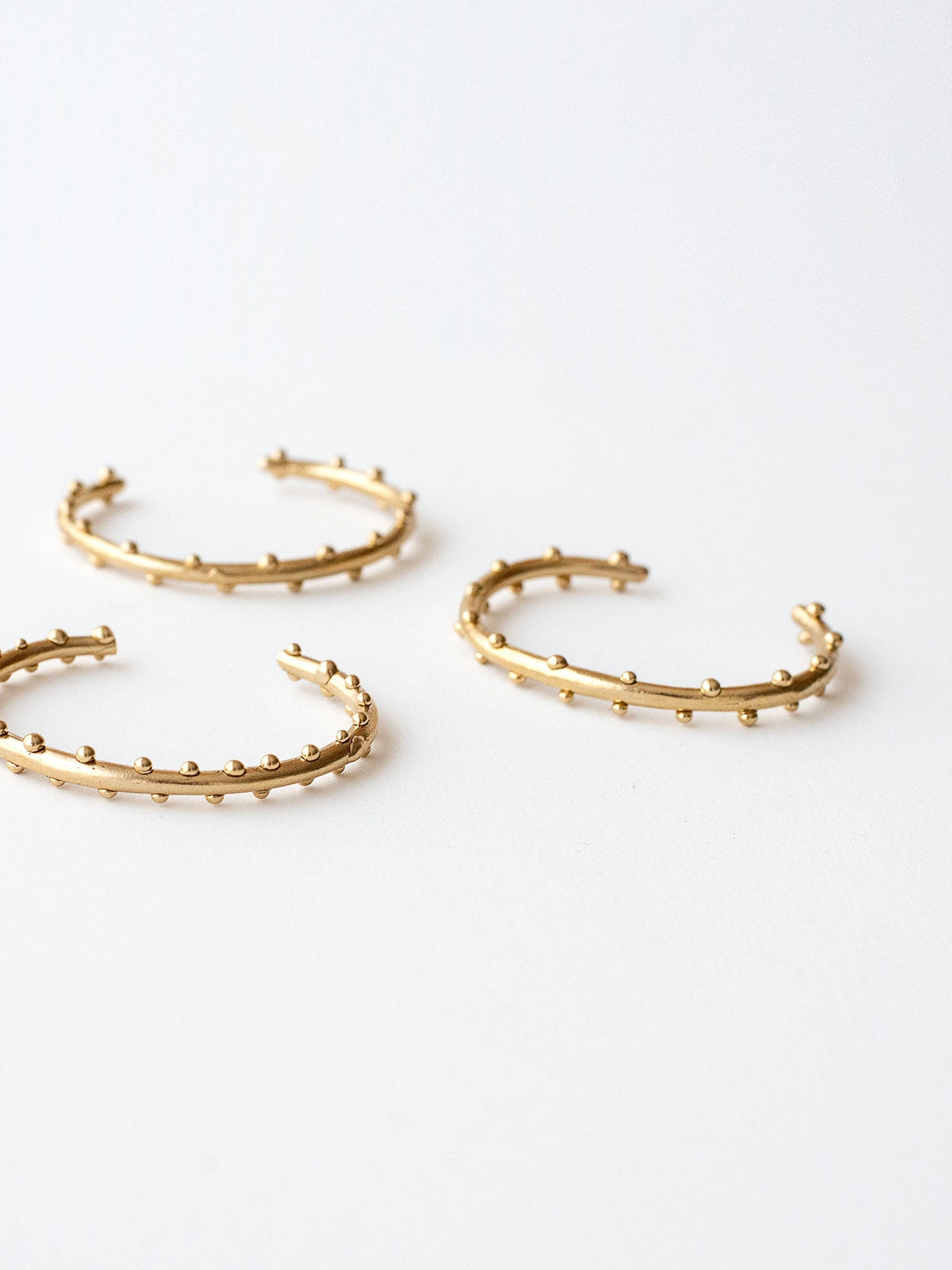 Uffi Thin Decorative Solid Brass Bangle Bracelet handmade by Michelle Ross