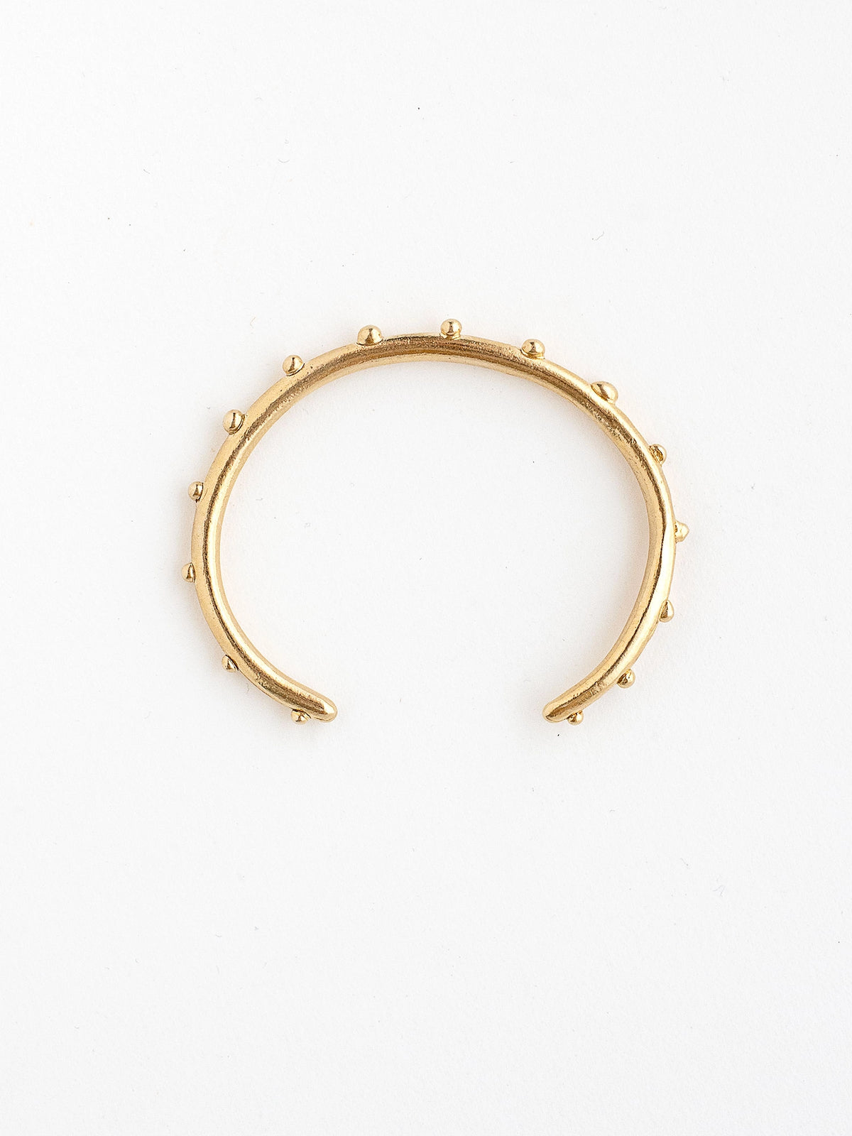 A handmade brass bangle bracelet by Michelle Ross