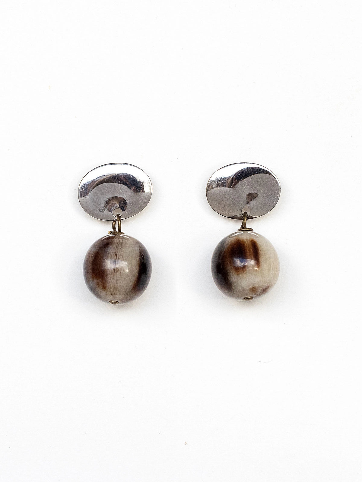 Pair of silver earrings with round brown horn drop beads by Michelle Ross