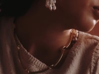 Video of Caito Asymmetrical Pearl and Brass Earrings with Helly Brass Collar Necklace by Michelle Ross